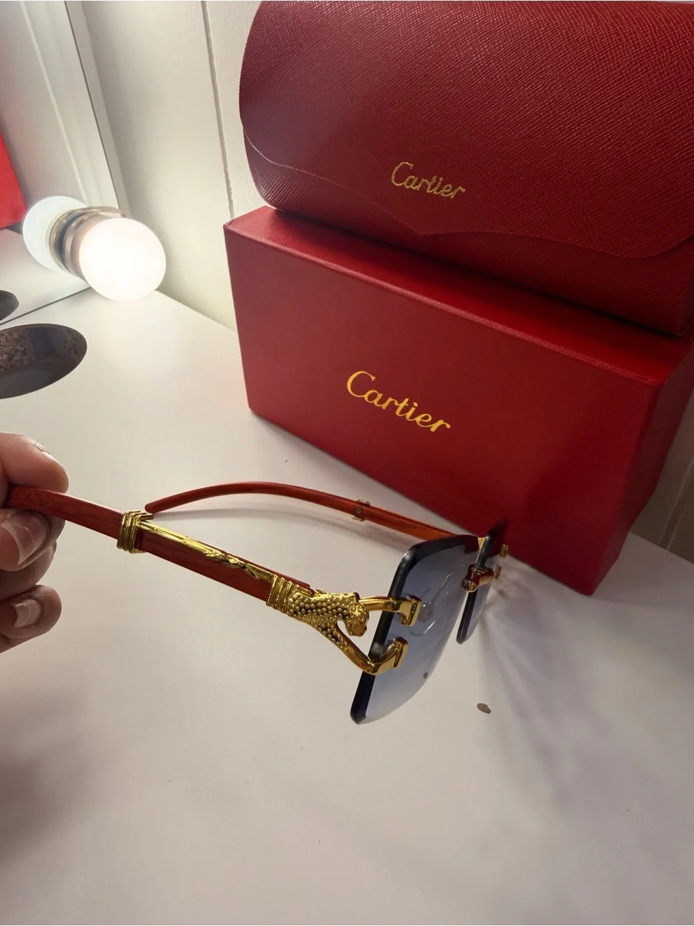 Cartier Men’s Rimless Sunglasses with Blue Gradient Lenses and Gold Accents